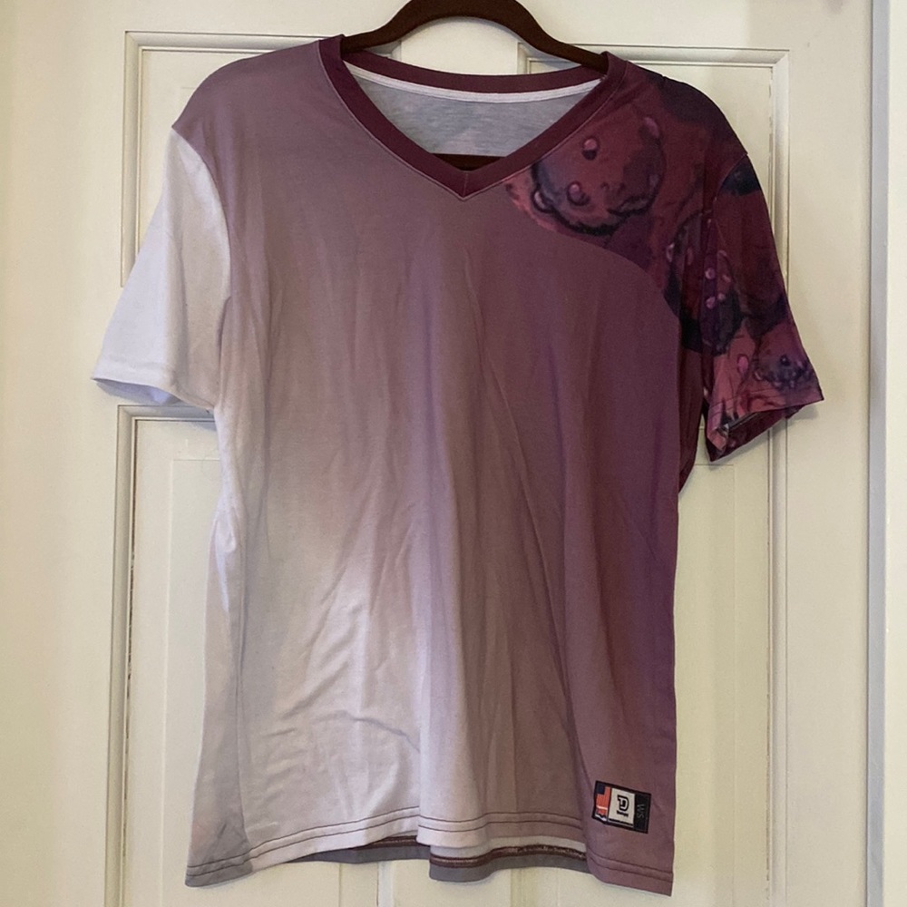 Soft tee with nurse middle finger to Covid detail on back.